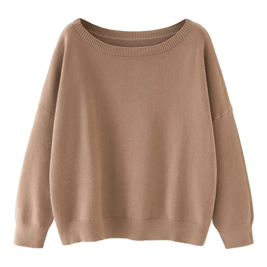 Sweter dzianinowy o casualowym stylu z opadającymi ramionami i długimi rękawami.