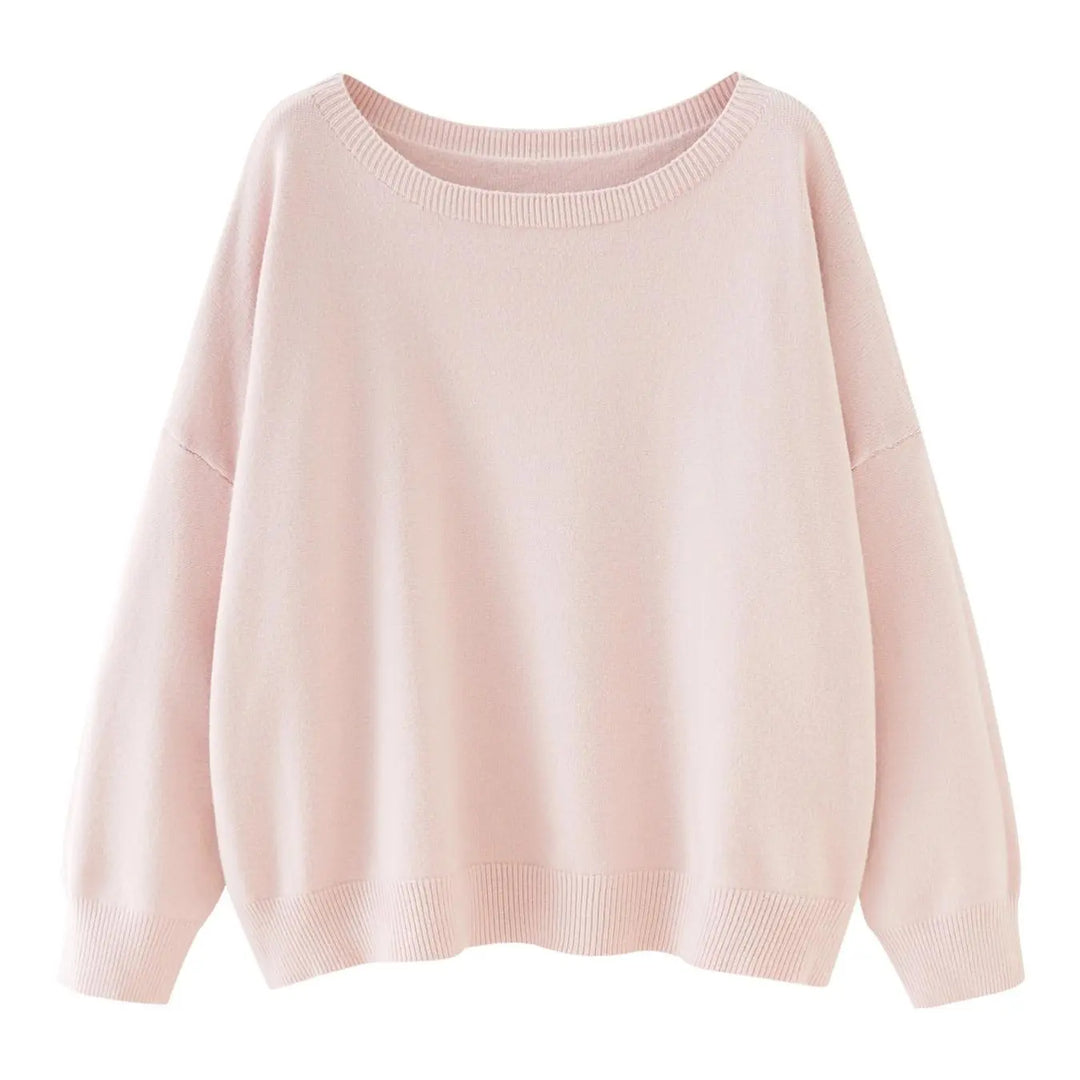 Sweter dzianinowy o casualowym stylu z opadającymi ramionami i długimi rękawami.